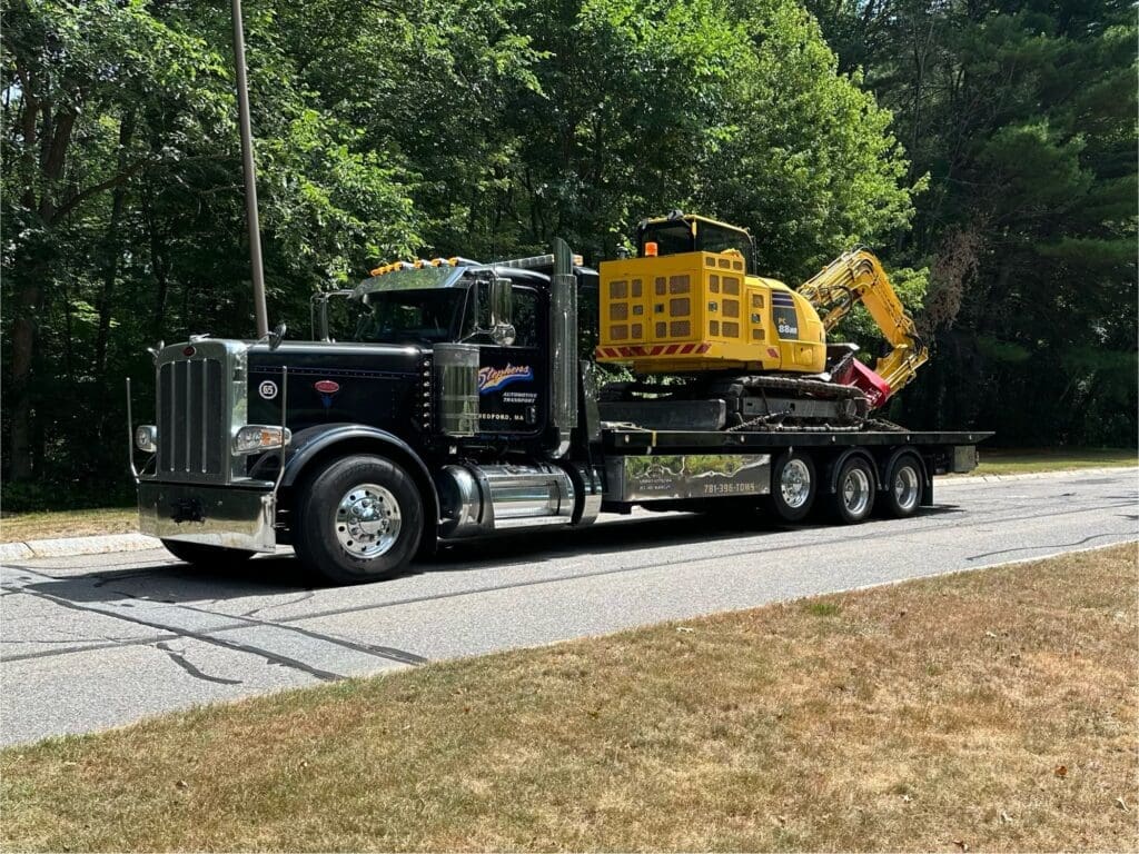 Truck 65 "22' Peterbilt 389 Tri-Axle Flatbed"