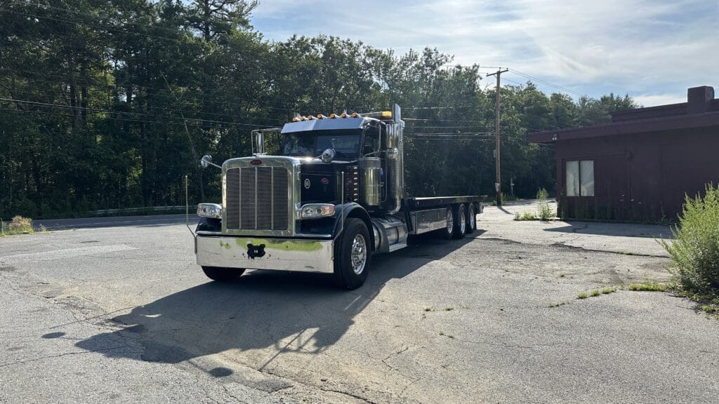 Truck 65 "22' Peterbilt 389 Tri-Axle Flatbed"